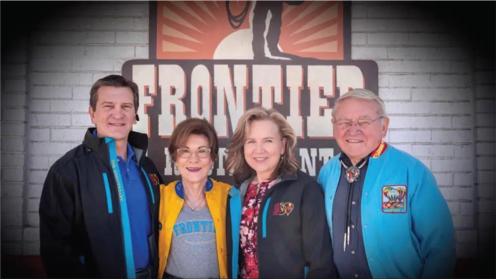 The Rainosek family standing together at the Frontier Restaurant