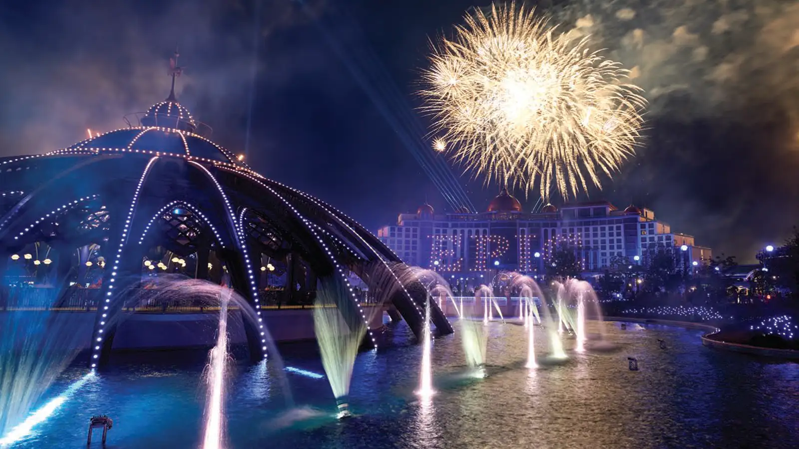 Epic Universe at night with Fireworks going off overhead