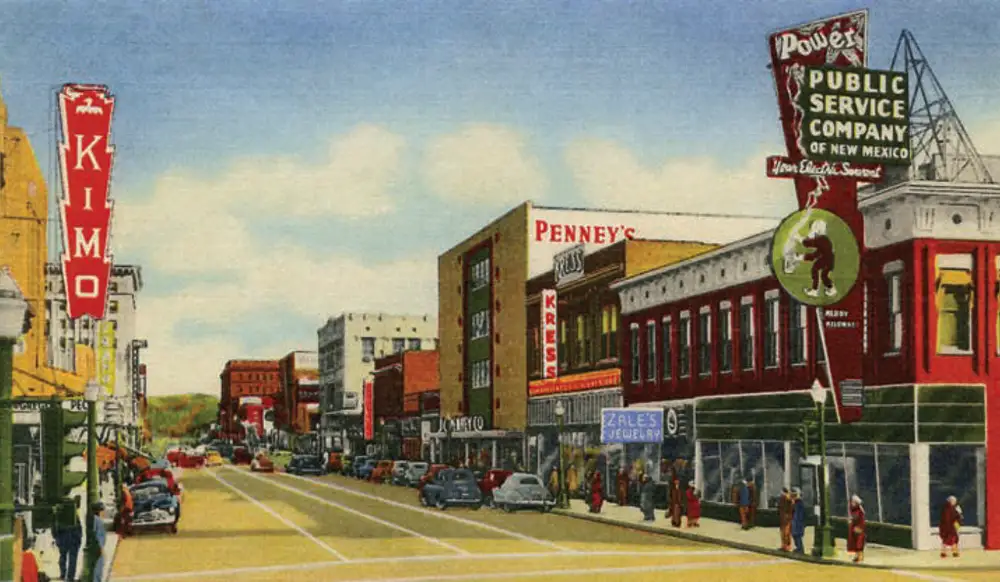 Historic postcard showing the Kimo Theatre and Public Service Company of New Mexico on Route 66