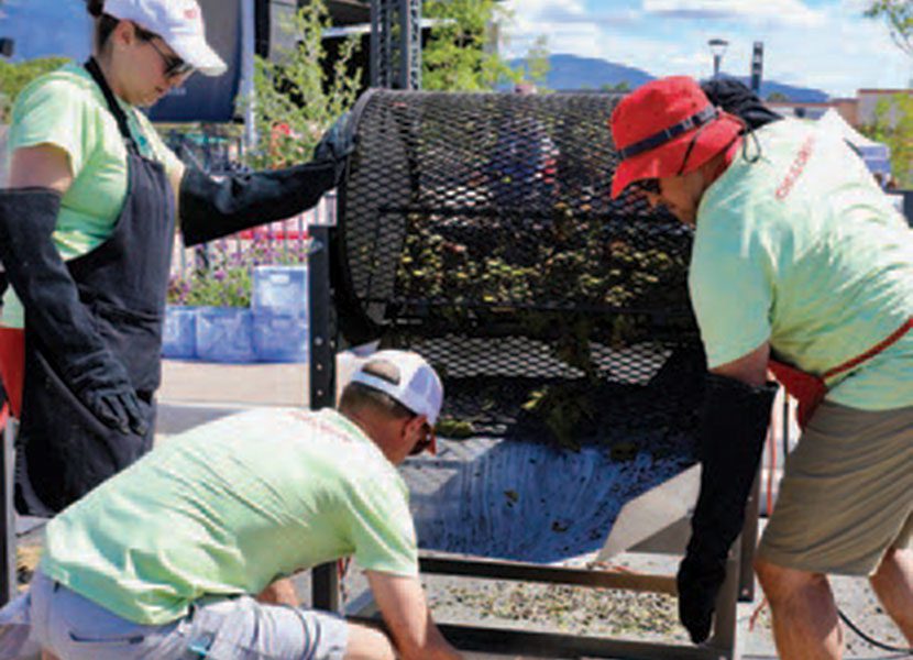 Alumni supervising chile roasters at the 2025 Albuquerque Green Chile Roast