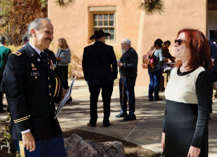 Veterans Day keynote speaker Jim R. Keene meeting UNM President Garnett S. Stokes